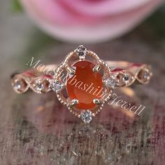 "Carnelian Ring, Carnelian Silver Ring, Engagement Ring, 925 Sterling Silver, Bridal Ring, Anniversary Ring, Orange Stone Ring, Ring For Her SHOP LINK:- https://www.etsy.com/shop/MaaShabashibaJewell?ref=seller-platform-mcnav 》D E T A I L S《 Gemstone: 1) Natural Carnelian 2) White Topaz Gem Color: 1) Orange 2) White Gem Shape: 1) Oval 2) Round Gem Size: 1) 5x7mm 2) 2x2mm Metal: 925 Sterling Silver Purity: 925 Parts Per 1000 Setting Type: Prong Set Silver Polish: High Ring Size: All Size Available Oval Carnelian Moonstone Ring For Anniversary, Orange Ruby Ring For Anniversary, Anniversary Orange Ruby Ring, Elegant Carnelian Rings For Wedding, Silver Carnelian Wedding Rings, Red Carnelian Wedding Rings, Orange Rings With Halo Setting As Gift, Oval Carnelian Wedding Rings, Gift Orange Rings With Halo Setting