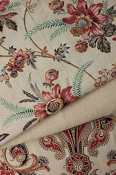 two different types of fabric with flowers and leaves on them