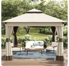 a gazebo sitting on top of a wooden deck