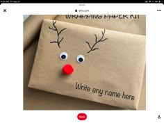 a paper bag with a reindeer face on it