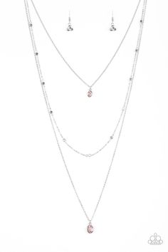 Three dainty silver chains layer down the chest. A glittery pink gem pendant swings from the uppermost chain, giving way to a shimmery silver chain embellished in glistening cube beading. Slightly larger in size, a matching pink gem pendant swings from the lowermost chain for a glamorous finish. Features an adjustable clasp closure. Sold as one individual necklace. Includes one pair of matching earrings. P2RE-PKXX-160XX Cheap Pink Metal Chain Necklace, Silver Dangle Charm Necklaces For Party, Pink Necklace With Adjustable Chain, Pink Metal Clavicle Chain Jewelry, Silver Charm Necklace With Delicate Chain For Party, Silver Delicate Chain Charm Necklace For Party, Pink Dangle Charm Necklace With Adjustable Chain, Elegant Pink Metal Chain Necklace, Sterling Silver Charm Necklace With Delicate Chain For Party