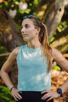 This tank is the perfect blend of comfort and style, ideal for workouts, running, or daily wear. Crafted from spandex and nylon, it offers just the right amount of stretch, making it your go-to favorite. The breathable, quick-drying fabric is also anti-bacterial, ensuring you stay fresh and comfortable all day long. 100% Nylon Model is 5'7" and 125 lbs wearing a Small/Medium Seamless Sleeveless Activewear For Running, Casual Go-dry Muscle Tee, Casual Compression Sleeveless Sports Bra, Go-dry Muscle Tee For Summer, Summer Athleisure Breathable Muscle Tee, Fitted Muscle Tee For Summer Workout, Fitted Summer Workout Muscle Tee, Casual Compression Racerback Tank Top, Athleisure Muscle Tee With Go-dry Technology