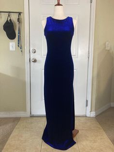 Stunning 90's vintage blue velvet sheath evening dress in size 7/8. Dress is in good vintage condition and has a size slit, plus gorgeous back detail with blue sequin butterfly closures.  Measurements laid flat: Pit to pit: 15 in Waist: 14 in Length: 57 in Sequin Butterfly, Velvet Sheath Dress, Back Details, Blue Velvet, Wedding Shop, Sheath Dress, Evening Dress, Labour Day, Vintage 90s