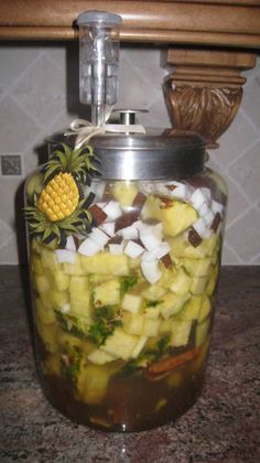 a jar filled with food sitting on top of a counter