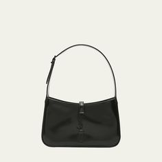 Saint Laurent "Le 5 À 7"  monogram hobo bag in patent calf leather. Shoulder bag that tucks under the arm for a sleek, retro-chic look. Adjustable shoulder strap, 8" drop Center flap top with YSL logo, tab closure. Black-tone hardware. Interior, zip pocket. Approx. 9"H x 6.3"W x 2.6"D. Made in Italy 5 A 7 Ysl, Ysl Shoulder Bag, Ysl Logo, Retro Chic, 6 D, Hobo Bag, Leather Shoulder Bag, Calf Leather, Patent Leather