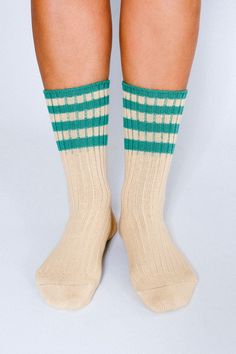 The Lexi is our mid-weight double-cylinder ankle featuring premium combed cotton knit with contrasting striping on an extended cuff. The thicker knit blend will keep your feet warm and steps soft. Size+ OSFA, W 6-10 Design+ 96 Needle+ Mid-weight+ Reinforced toe & heel+ Seamless toe+ Sweater knit+ Tall ankle Content + Care+ Premium Combed Cotton+ Wash Cold/Dry Low+ Imported Neon Moon, Crew Sock, Heather White, Black Sand, Sweater Knit, Cotton Knit, Crew Socks, Combed Cotton, Wearable Art