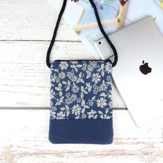 This cell phone bag has the right size for you to go shopping, to the gym or for a walk with your cell phone, ID card, keys and small things. There is a zipper on the top to keep things safe.Material: high quality canvas, cotton fabric, zipperDimension: 19.5cm x 15cm (7-3/4" x 5-7/8")Strap: 140cm (55")Inside: with cotton inner liningProduction time: about 3-4 working days (excluding holidays), shipped within two days after completion. ★other information--Kindly pls be noted that the fabric and l Rectangular Travel Pouch With Cell Phone Pocket, Functional Rectangular Shoulder Bag With Cell Phone Pocket, Functional Phone Bag For Daily Use, Blue Travel Pouch For Mobile Phone, Multifunctional Pouch With Cell Phone Pocket For Daily Use, Blue Mobile Phone Pouch For Travel, Multifunctional Daily Use Pouch With Cell Phone Pocket, Daily Use Mobile Phone Shoulder Pouch, Blue Mobile Phone Travel Pouch