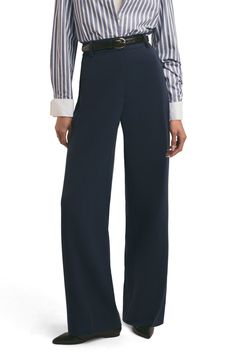 Polish off your ensemble in these stretch-kissed wide-leg pants featuring convenient pockets and a chic high rise. 34" inseam; 25" leg opening; 15" front rise; 19" back rise (size 18) Zip fly with hook-and-bar closure Front slant pockets; back welt pockets 63% polyester, 32% rayon, 5% spandex Machine wash, tumble dry Imported High Waist Wide Leg Pants, Favorite Daughter, Fabric Gift Bags, Nordstrom Store, Free Fabric, Fabric Gifts, Welt Pocket, Wide Leg Pants, Wide Leg