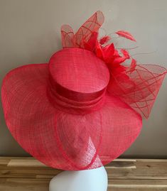 Red Top Hat For Summer Church, Red Flat Brim Boater Hat For Kentucky Derby, Formal Red Feathered Hat, Formal Red Hat With Feathers, Elegant Red Feather Trim Fascinator, Elegant Red High Crown Mini Hats, Elegant Red Mini Hat With High Crown, Elegant Red Fascinator With Feather Trim, Red Short Brim Straw Hat For Kentucky Derby