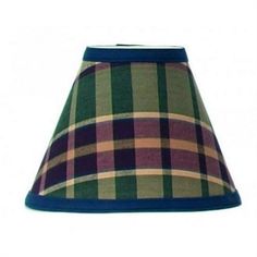 a lamp shade with a blue bottom and plaid pattern on it's fabric lining