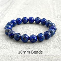 Men's beaded bracelet features: ~ 6mm, 8mm or 10mm lapis lazuli beads ~ 6mm, 8mm or 10mm onyx beads ~ 6mm, 8mm or 10mm hematite beads ~ Stretchy cord; simply slide bracelet on and off wrist ~ Comes packaged in a re-usable micro fibre pouch To ensure the perfect fit, please use the bracelet sizing instructions found in the photo gallery. Polished Beads Lapis Lazuli Round Bracelets, Round Lapis Lazuli Bracelets With Polished Beads, Polished Beads Lapis Lazuli Bracelets, Adjustable Lapis Lazuli Bracelet With 8mm Beads, Lapis Lazuli Beaded Bracelets With Polished Round Beads, Adjustable Lapis Lazuli Stretch Bracelet With Round Beads, Lapis Lazuli Beaded Bracelets With Gemstone, Lapis Lazuli Gemstone Beaded Bracelets, Blue Lapis Lazuli Beaded Bracelets