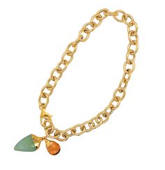 Product Description: Show off your style and glam with this sparkly, golden Gemstone Charm Bracelet! Whether you choose the chalcedony and citrine charms, or the jade and citrine charms - you're sure to feel dazzling and extra chic! With all the bling, this bracelet is sure to be the rage. Product Details: Material: Vermeil (14K Yellow Gold over Sterling Silver) Genuine gemstones (chalcedony and citrine or jade and citrine) Lobster claw clasp Length: 8" Stone Sign, Gold Overlay, Bracelet Design, Jewelry Studio, Charm Bracelets, Bracelet Designs, Lobster Claw, Citrine, Jade