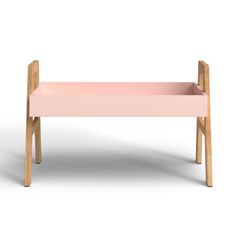 a pink bench with wooden legs on an isolated white background for display or montage