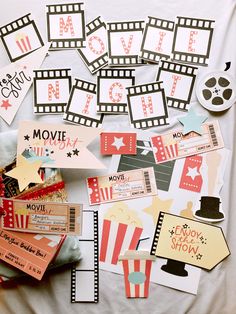 some movie themed items are laying out on a sheet of paper with the words movies written across them