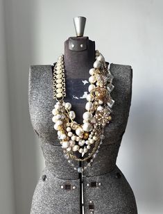 As we head into fall, who doesn't love a classic over the top pearl statement necklace?!  This piece is just that and I enjoyed every minute of putting this classic piece together.  Starting from the left is a stunning repurposed vintage confetti lucite bracelet.  The strands are composed of several repurposed vintage lucite, glass, and cotton pearls from the 50's-60's!  Repurposed vintage rectangular chain and a brighter gold filigree textured chain are incorporated just to bring out more of th Pearls Outfit Casual, Pearls Outfit, Pearl Outfit, Shabby Chic Wardrobe, Top Pearl, Necklace Art Deco, Pearl Statement Necklace, Necklace Art, Swarovski Crystal Necklace