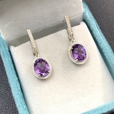 This Earring is made from Natural Purple Amethyst and 925 sterling silver. This Earring is finely polished to give a brilliant mirror finish. With rejuvenating design and sleek appearance, this Earrings looks stunning on Ear Materials:- Silver (925 Solid Sterling Silver) Gemstone:- Natural Purple Amethyst Item  Weight :- 5.21 Grams Approx. Stone Size :- 8 x 10 MM  Stone Shape:- Oval (Checker Cut) Payment Policy :- We accept payment through PayPal. All payments must be made within 7 days of purchase. If you are experiencing some difficulty in paying through PayPal and need additional time, please  contact us. Shipping Policy All Item will Be Shipped Through India Post International within 1-3 Business Days after  Received Payment. Shipping Times :- 3 To 4 Weeks . If You Need Faster Shipping Amethyst Birthstone, 21 Grams, Amethyst Jewelry, Jewelry Handmade, Purple Amethyst, Vintage Earrings, Silver 925, Sterling Silver Earrings, Jewelry Earrings Dangle