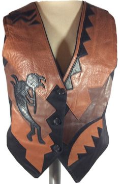 Vintage 1996 Pietra C. Wall Elegantissimo By Piero (?) see Pictures Black Canvas/Leather Vest Tribal Kokopelli & Multi Leather Design Front/Back Stunning Beautiful Wearable Art Vintage Circa 1996 Condition- Vintage pre-owned but new condition absolutely no wear whatsoever pristine Measurements: (Laid Flat) Armpit to Armpit 18” Across Front shoulder to longest “V” tip- 25” Back Neckline to Hemline - 18” Shipped with USPS Priority Mail. Western Vest, Leather Vest, Black Canvas, Leather Design, Canvas Leather, Art Vintage, Wearable Art, Priority Mail, Wedge Boot