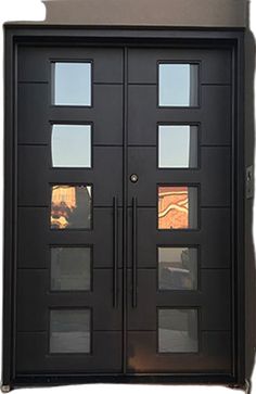 a black double door with glass panels