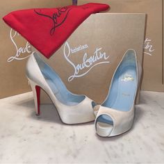 Iconic Limited Edition White Ivory Crepe Satin Hyper Very Priv 120 Christian Louboutin Bridal Collection Platform Heels With Blue Inner Soles In Pristine Condition. Will Include Box And Bag. They Have New Tips And Non-Slip Soles. #Bridalcollection #Louboutinweddingshoes #Christianlouboutinlimitededition #Christianlouboutinbluesoles #Limitededition #Christianloyboutinwedding #Ivorysatin #Limitededition#Bluesoles Luxury Wedding Shoes With Padded Heel And Almond Toe, Luxury Fitted Wedding Shoes With Padded Heel, Luxury Open Heel Wedding Shoes With Branded Heel Counter, Luxury White Wedding Shoes With Padded Heel, Luxury Cream Open Toe Wedding Shoes, Luxury Wedding Shoes With Padded Heel And Round Toe, Luxury 4-inch Cream Heels, Designer Wedding Heels With Sculpted Heel, Luxury Wedding Shoes With Round Toe