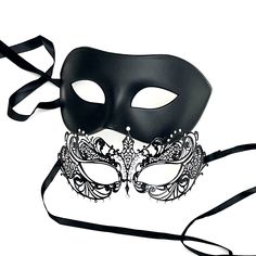 Both masquerade masks come in black. A classic design for men while the woman's mask is specially designed to look sheen with embedded rhinestones. Black Masquerade Mask Women, Mask Ball Party, Mens Mask, Masquerade Mask Women, Black Masquerade, Black Masquerade Mask, Mask Ball, Metal Mask, Mask Drawing