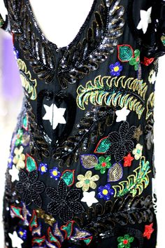 "Heavily embellished..to me this looks so much like a holiday dress..with so many flourishes in this!! All beaded and all in very good to Excellent condition! Keyhole back..zips up the back..absolutely beautiful! Measuring: 37\" length Bust: 36\" Waist:30\" Hip: 36\" Pet Free/smoke free Enjoy!" Hand Embellished Multicolor Party Dresses, Multicolor Hand Embellished Party Dress, Elegant Hand Embellished Multicolor Dresses, Embellished Evening Dress For Festivals, Elegant Sequined Dresses For Festivals, Festive Multicolor Embellished Dress, Festive Multicolor Hand Embellished Dress, Festive Multicolor Hand-embellished Dress, Embellished Multicolor Evening Dress