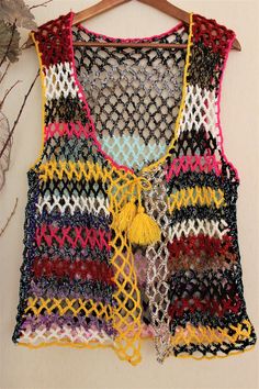 Crochet knitted vest, colorful vintage style, knitted upcycled, women sleeveless vest size 12-16 fit, unique crochet, recycled boho tops Multicolor Knit Sleeveless Vest, Multicolor Knitted Sleeveless Top, Multicolor Sleeveless Knitted Tops, Multicolor Knit Vest Top, Bohemian Yarn Crochet Top, Multicolor Hippie Festival Vest, Bohemian Hand Knitted Crochet Top For Vacation, Bohemian Crochet Patchwork Top For Summer, Bohemian Patchwork Crochet Top For Summer