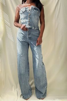 This denim strapless jumpsuit has a button-up front closure with pocket detailing and a comfortable elastic stretch-backed bodice. This has a wide leg fit with minimal stretch. 100% Cotton Model is wearing a S Inseam length size S 30.5" Fits true to size according to our size chart Casual Wide-leg Denim Jumpsuit With Pockets, Chic Non-stretch Medium Wash Denim Jumpsuit, Cotton Denim Jumpsuit With Button Closure, Straight Leg, Medium Wash Button-up Denim Jumpsuit With Pockets, Non-stretch Denim Jumpsuit With Button Closure, Strapless Jumpsuit, Pocket Detail, Swimwear Accessories, Set Dress