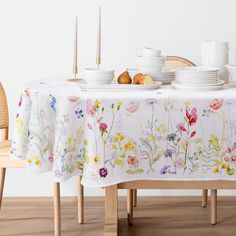 a table with plates and bowls on it