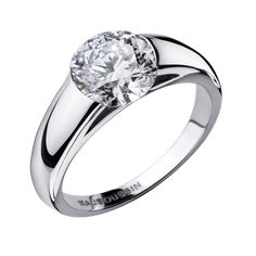 a white gold ring with a round diamond