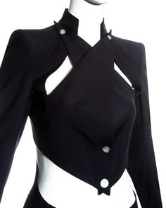 For Sale on 1stdibs - Alexander McQueen; black wool blazer jacket. Exaggerated lapels cross over and fasten on the shoulder line and cut out on the midriff. Spring-Summer 1999 Jacket Half Off Shoulder Reference Drawing, Jacket Off Shoulder Drawing Reference, Black Wool Blazer, Futuristic Fashion, Mode Inspo, 가을 패션, Fantasy Fashion, Character Outfits, Mode Inspiration