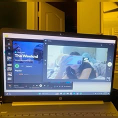 a laptop computer sitting on top of a desk