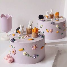 two cakes decorated with flowers and bunnies