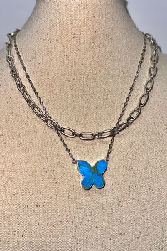 Embrace elegance and a touch of whimsy with our Turquoise Butterfly Pendant Necklace. This stunning piece features a beautiful turquoise butterfly charm, delicately crafted to bring out the natural beauty of the stone. The butterfly pendant hangs gracefully from a high-quality, adjustable silver chain, adding a charming accent to any outfit. Details: Material: Turquoise, Silver-Plated ChainPendant Size: Approximately 1 inchChain Length: Adjustable from 18 inches to 20 inchesClosure: Lobster Clas Turquoise Butterfly Sterling Silver Jewelry, Elegant Turquoise Butterfly Jewelry, Turquoise Butterfly Charm Jewelry Gift, Bohemian Butterfly Charm Jewelry For Jewelry Making, Turquoise Butterfly Jewelry For Gifts, Turquoise Butterfly Jewelry For Gift, Bohemian Jewelry With Butterfly Charm For Jewelry Making, Bohemian Necklace With Butterfly Charm, Bohemian Dangle Jewelry With Butterfly Charm