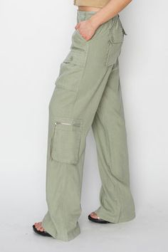 High rise straight cargo pants in sage-NEW – JanieLanie Spring Mid-rise Cargo Pants With Pockets, Spring Mid-rise Cargo Pants With Cargo Pockets, Spring Mid-rise Cargo Pants, Spring Mid-rise Bottoms With Flap Pockets, Spring Khaki Cargo Jeans With Side Pockets, Green Straight Leg Parachute Pants For Spring, Spring Utility Cargo Jeans In Khaki, Mid-rise Bottoms With Flap Pockets For Spring, Spring High Rise Pants With Flap Pockets