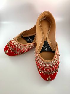 dhaage.london We Bring you our latest collection. These beautiful Red khussas/Juttis are handcrafted, incredibly soft and anti-slip sole. This will give you Comfort and style all in one!    . #jutti #khussa #shoes #punjabishoes #juttilovers #summer #desiclothes #casualshoes #indian #pakistani #desi #fashion #desifashion #kaleeray #accessories #tradionalshoes #handmade #summer #summervibes #wedding #desiwedding #partywear #eid #simplekhussa #pakistanifashion #punjabifashion #ladies #shoes Red Round Toe Flats For Wedding, Traditional Closed Toe Ballet Flats For Festive Occasions, Diwali Reception Flats, Meenakari Slip-on Flats For Wedding, Bollywood Style Meenakari Flats For Wedding, Cut Dana Flats For Diwali, Bollywood Meenakari Flats For Weddings, Traditional Red Closed Toe Flats, Wedding Meenakari Slip-on Flats