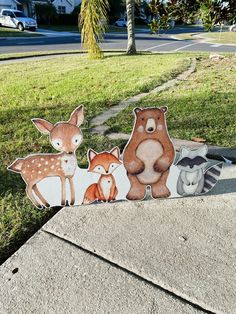 an image of some animals on the sidewalk