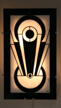 a black and white art deco light fixture