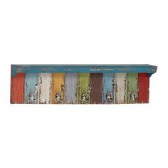 an old wooden shelf with colorful paint on the top and bottom, painted in different colors