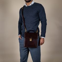 A perfect companion for the modern man. A small full-grain leather briefcase with a classic, timeless look and a sturdy frame for those who like to keep it light and leave the home office at home. But since you cannot fit your wallet, smartphone, keys, and now a tablet in the pockets of your pants, this is the bag that will accommodate those essentials that you can't leave home without. This small and compact bag has the look of a classic business briefcase combined with the ease of carrying a messenger bag. Features * Tablet sized - fits iPad Mini, Kindle, and Nook. All at once if you wish; * Carry handle with pleasant grip for easy carrying in hand; * Detachable shoulder strap; * Two main compartments and additional pockets outside and inside; * An outside zip pocket right at your side; Luxury Rectangular Briefcase For Gift, Luxury Rectangular Briefcase As Gift, Business Crossbody Bag With Coin Pocket, Luxury Shoulder Bag With Coin Pocket For Business, Business Satchel Shoulder Bag With Coin Pocket, Business Crossbody Bag, Luxury Rectangular Shoulder Bag With Coin Pocket, Professional Brown Bag For Formal Occasions, Professional Brown Bags For Formal Occasions