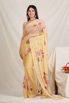 This is a beautiful pure chiffon light weight saree .  Fabric - Pure chiffon  Color - Cream color  Technique - Hand painted Saree length - 5.5 mtr.  Blouse - same running blouse 90 cm. Wash and care - Dry clean only . Please note - color may be vary a little due to sunlight and photography . Please message us after purchasing in case you want fall and Pico done it not .  No extra charges for fall and Pico but inform us .  Blouse stitching is also available . Summer Pre-draped Georgette Saree With Sheer Dupatta, Summer Floral Print Saree, Floral Print Saree For Summer, Summer Georgette Pre-draped Saree, Summer Organza Saree With Pallu, Summer Organza Saree, Summer Chanderi Saree, Summer Floral Embroidered Saree With Traditional Drape, Summer Saree With Floral Embroidery In Traditional Drape