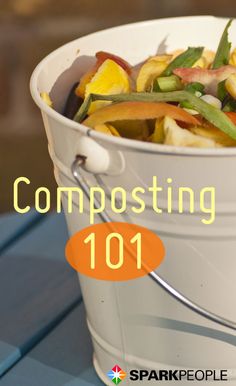 a white bucket filled with lots of food on top of a blue table next to an orange tag