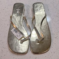 Brand New, Never Worn Light Gold Size 8 Thong/Flip Flop Sandals. Slight 1/4 Inch Wedge. Man Made Materials. Offering Free Shipping On These. Price As Listed Is The Lowest Price I Can Go Considering Poshmark Takes A Fee. Sparkly Sandals, Gold Wedges, Jeweled Sandals, Leather Thong Sandals, Studded Heels, Strappy Wedges, Studded Sandals, Black Leather Sandals, Gold Sandals