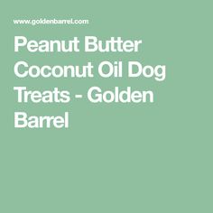 the peanut butter coconut oil dog treats golden barrel is shown in white on a green background