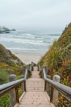 stairs lead down to the beach and ocean