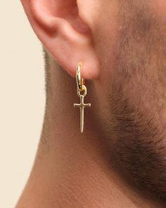 Be bold and defiant in our men's gold Dagger Cross Earring. This single earring features classic gold hoop with a daring dagger charm for playful, eye-catching movement. As always, our earrings are crafted with a 925 silver post for sensitive skin. Collect two to make it a set! Mens Gold Hoop Earrings, Dagger Earrings, Solid Gold Chains, Silver Shop, Cross Earrings, Mens Gold, Classic Gold, Pendant Bracelet, Gold Hoop