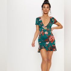 Channel A Fiercely Femini Fit With This Unreal Cross Back Dress Doll. Featuring An Emerald Green Material With A Red Floral Print, Frill Hem Detailing, A Lace-Up Back Design And Short Sleeves, We Just Can't Get Enough. This Figure-Flattering Bodycon Dress Will Have Heads Turning For All The Right Reasons No Matter That The Occasion. Just Add Heels And Statement Accessories For A Look That Will Earn You Some Serious Style Points. Uk Size 24 Us Size 28 Per Tag Equivalent To Xxl Emareld Green Dress Short, Emerald Green Dress Short Bodycon, Luxury Floral Print Mini Dress With Square Neck, Emerald Green Short Dress Accessories, Emerald Green Bodycon Dress Short, Green Corset, Emerald Green Dresses, Ruched Midi Dress, Wedding Guest Dresses