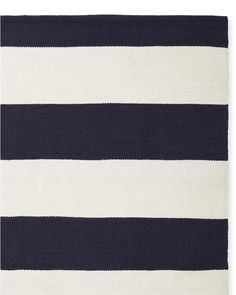 a black and white rug with horizontal stripes