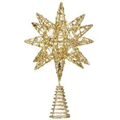 a gold christmas tree topper with an intricate star design on it's side