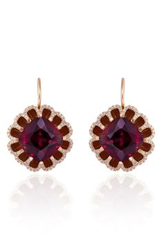 Part of our online trunk show, this style is available for a limited time from April 15 through May 12.Rich rhodolite garnet stones appear to float against the brilliant diamond halo of these cushion-cut drop earrings set in rosy 18-karat gold. 1" drop; 3/4" width   Lever-back closure   Total rhodolite garnet weight: 15.50ct.   Total diamond weight: 0.61ct.   Color: G–H   Clarity: VS   18k gold/rhodolite garnet   Made in the USA   >Diamond Guide Rose Diamond, Diamond Guide, Garnet Earrings, Garnet Stone, Rhodolite Garnet, Red Earrings, Diamond Drop Earrings, Rose Earrings, Diamond Halo