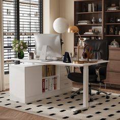 a home office with black and white decor